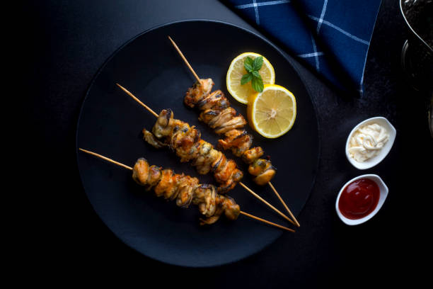 istock Fried mussels, delicious skewered mussels (Turkish name; midye tava, cöp sis midye) 1332170675