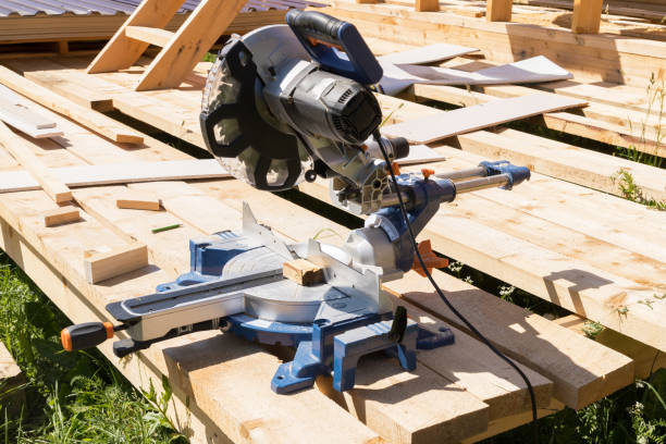 istock High-speed cutting circular saw. The man's hands are gloved. 1332171607