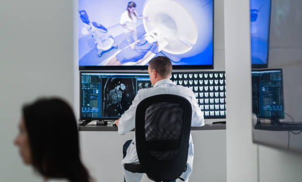 istock Medical Professionals In Special Workplace For Analyzing Medical Scans 1332172033
