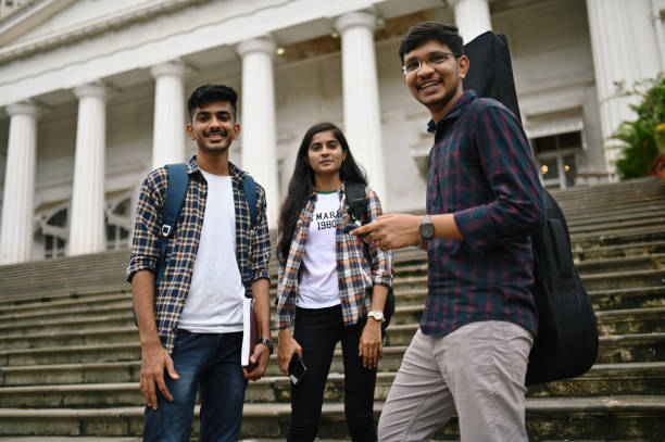 istock Students standing and talking in the University campus 1332175535