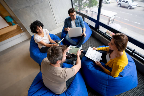 istock Group of workers in a business meeting at a creative office 1332176267