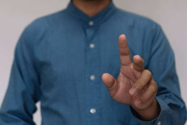 istock Young handsome man wearing light blue shirt  with different behaviors at work 1332180947