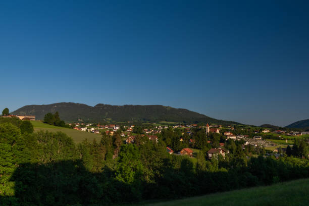 Semriach village with Schockl hill over in sunset sunny evening