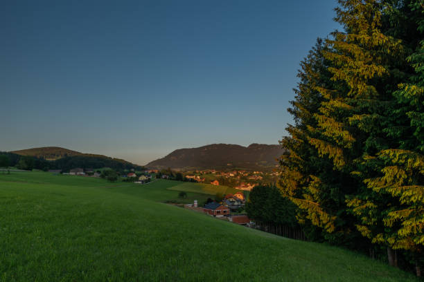 Semriach village with Schockl hill over in sunset sunny evening