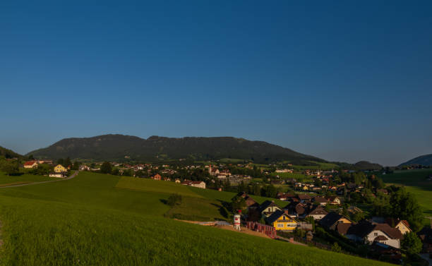 Semriach village with Schockl hill over in sunset sunny evening