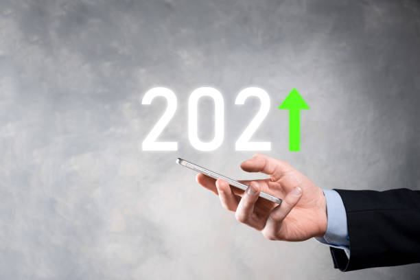 istock Business development to success and growing growth year 2021 concept.Plan business growth graph in year 2021 concept.Businessman plan and increase of positive indicators in his business 1332185465