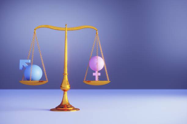 concepto de igualdad de género - gender symbol scales of justice weight scale imbalance fotografías e imágenes de stock