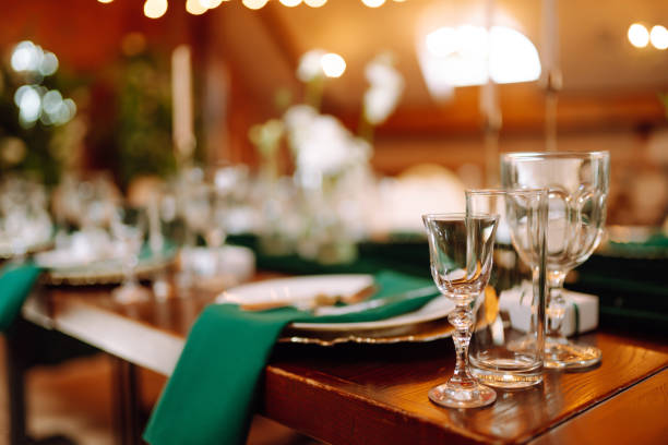 istock Banquet Seating Table in the restaurant in emerald color 1332188290