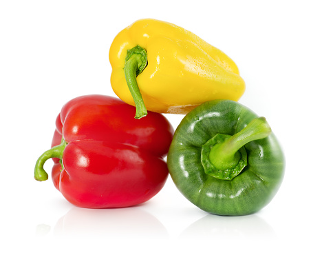 Set of colorful bell pepper isolated on white background top view. Raw red, yellow and green bell pepper.