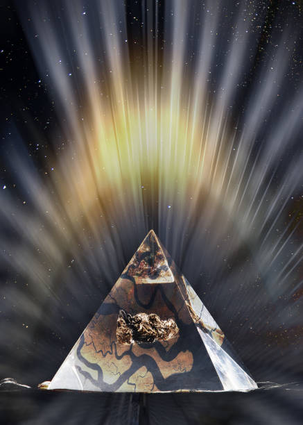 Pyramid masonry symbol in light rays at starry night. Elements of this image furnished by NASA.\n\n/nasa urls used for this collage:\nhttps://images.nasa.gov/details-jsc2018e003239_alt.html\nhttps://images.nasa.gov/details-sts087-707-092.html\nhttps://images.nasa.gov/details-KSC-2011-7252.html\nhttps://solarsystem.nasa.gov/resources/429/perseids-meteor-2016/