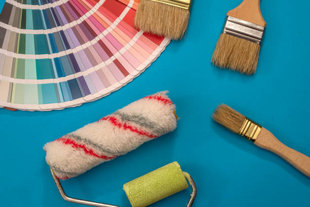 istock paint brushes on palette of different colors and shades 1332193519