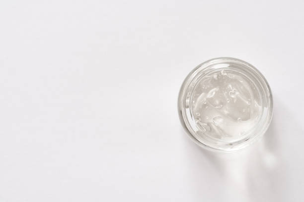 istock Aloe vera gel in a cosmetic jar on white background 1332193524