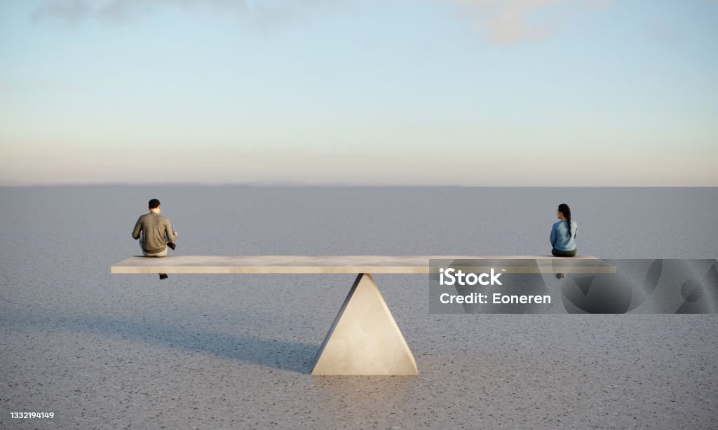 Gender Equality Concept Man and woman are sitting on concrete seesaw, symbolizing gender equality. (3d render) Gender Equality Stock Photo