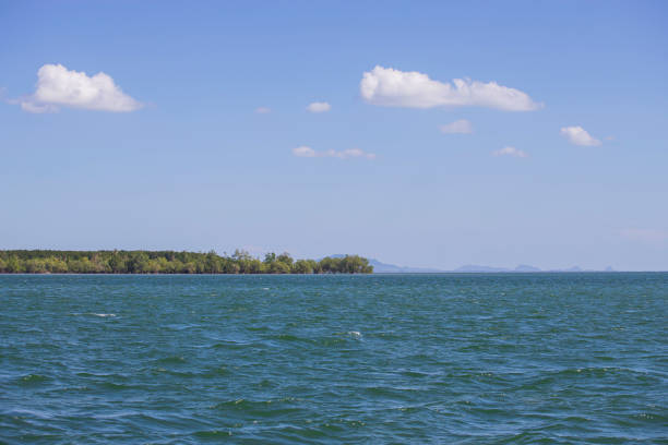 istock blue sea with island 1332194923