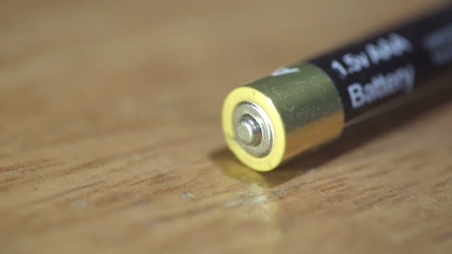 Extreme close-up of Alkaline batteries on the table