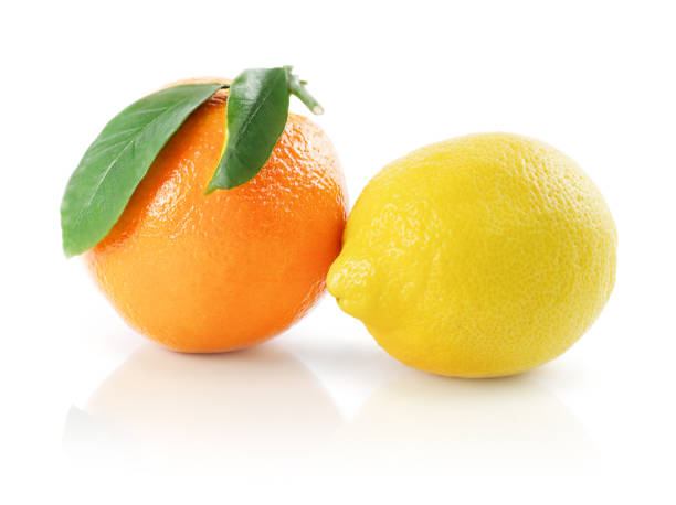 Ripe Tangerine / Mandarin and Lemon on White Background