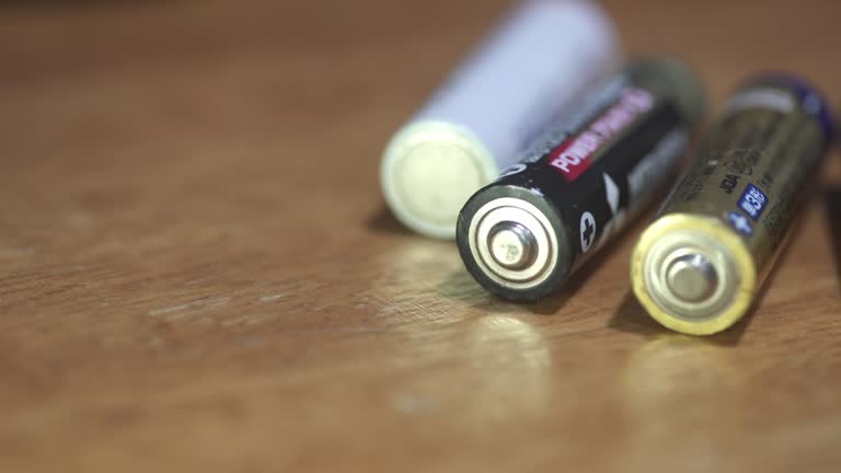 Extreme close-up of Alkaline batteries on the table