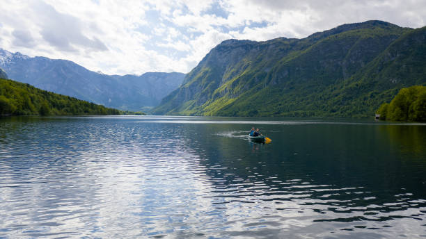 istock Paddling on a beautiful turquoise lake 1332198338
