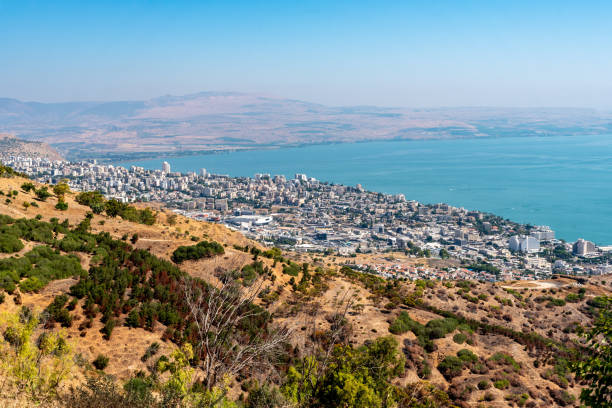 View of the city of Tiberias and The Sea of Galilee View of the city of Tiberias and The Sea of Galilee in Israel sea of galilee stock pictures, royalty-free photos & images