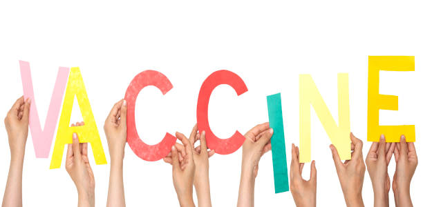 istock hands holding alphabets and forming a vaccine word, covid concept 1332204624