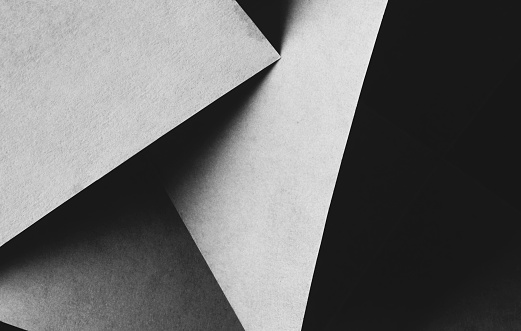istock Geometric shapes made paper, dark background 1332205440
