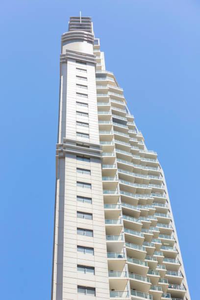 istock Modern apartment building, skyscraper, sky background with copy space 1332207313