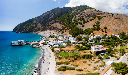 Aerial view of the village of Agia Roumeli at the exit of the Samaria Gorge on the Greek island of Crete in July 2021