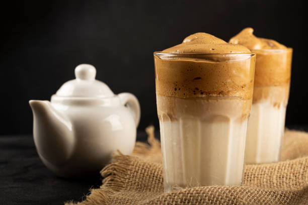 istock Iced Dalgona Coffee, glass with milk and coffee cream. 1332215024