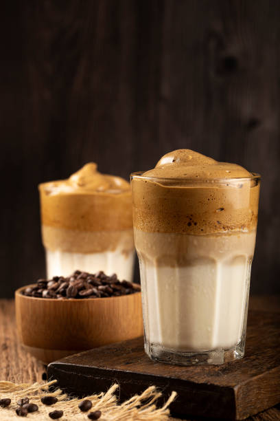 istock Iced Dalgona Coffee, glass with milk and coffee cream. 1332215125