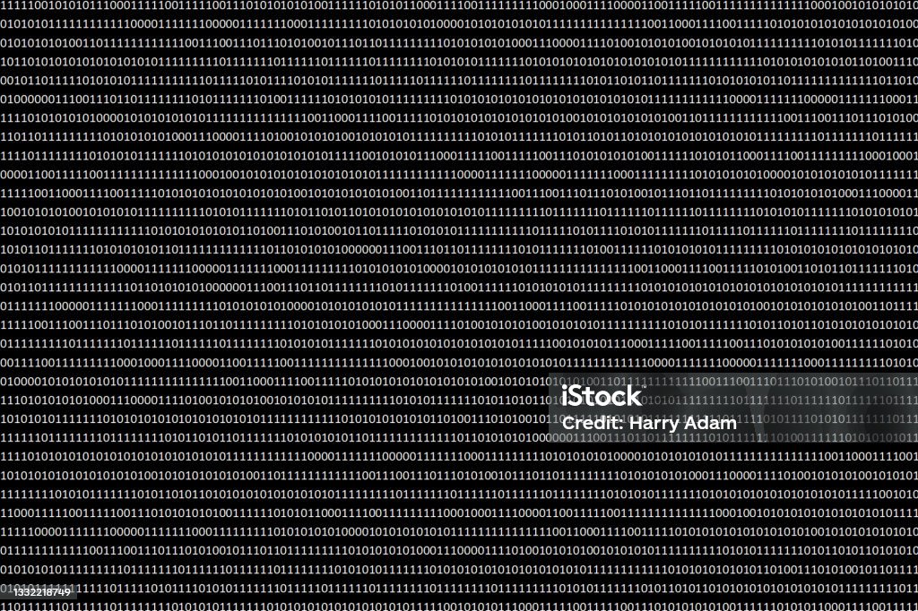 Displaying binary code against a colored background Displaying binary code against a colored background on a computer screen Binary Code Stock Photo