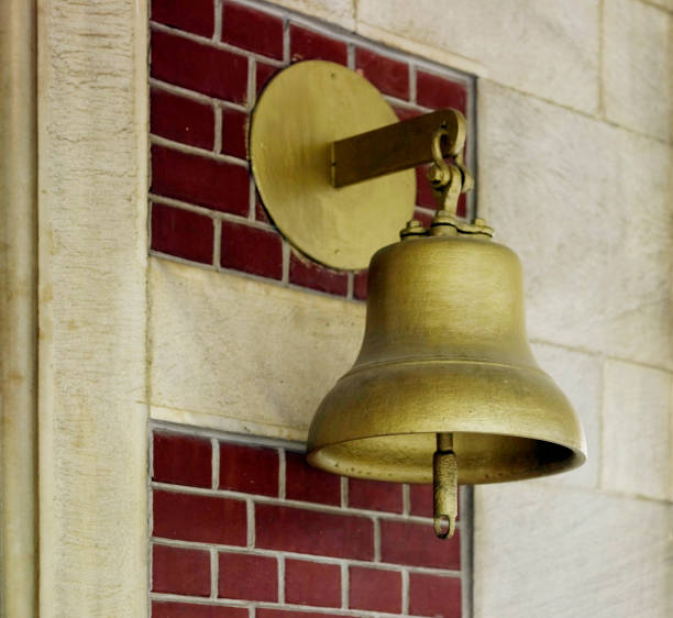 istock Golden bell at train station platform 1332220045