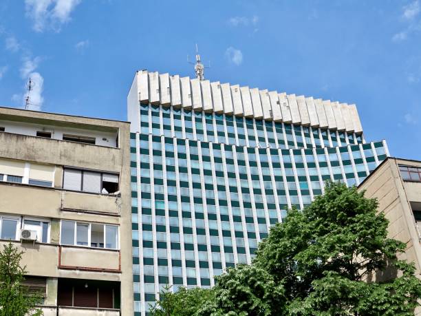 istock A modern skyscraper emerging among old residential buildings 1332221322