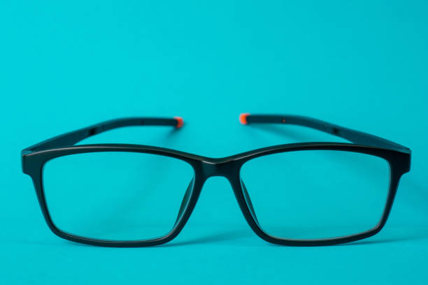 istock Anti-radiation glasses isolated on blue background 1332221724