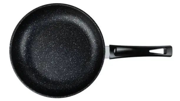 A black ceramic-coated frying pan with silver flecks. Inside is embossed in the form of honeycombs. A black handle. On a white background