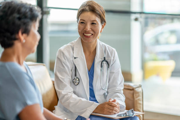 istock Woman consults her doctor 1332226521