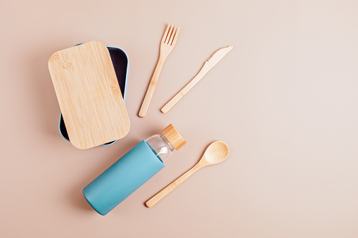 Zero waste kit for lunch, reusable bottle, box and bamboo cutlery. Sustainable lifestyle concept