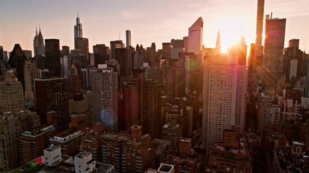 istock Sun Setting Behind Midtown Manhattan - Aerial 1332231343