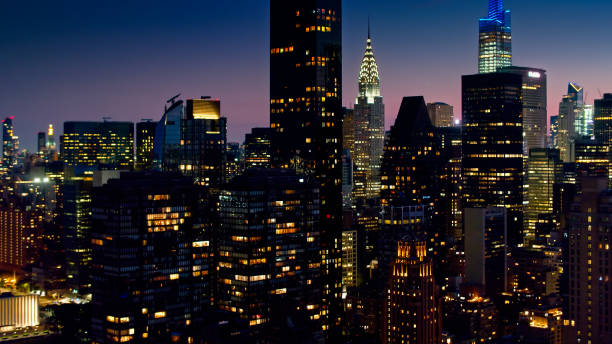 istock Midtown Manhattan at Night - Aerial 1332231365