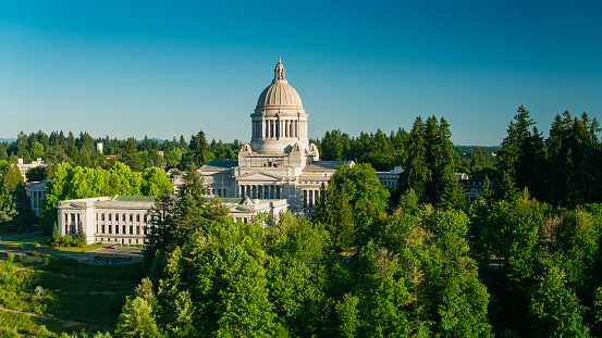 Aerial shot of the state capitol building and supreme court in Olympia, Washington on a summer afternoon.