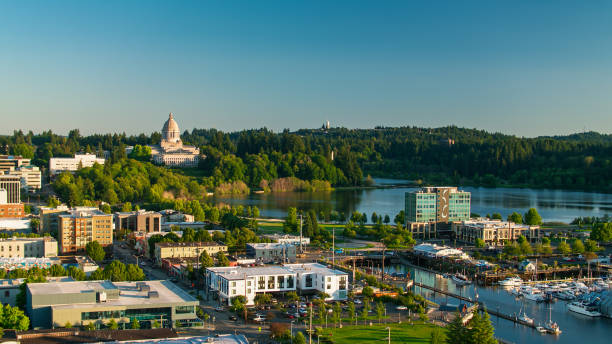 Aerial shot of Olympia, Washington on a summer evening, looking across the downtown towards the state capitol building.