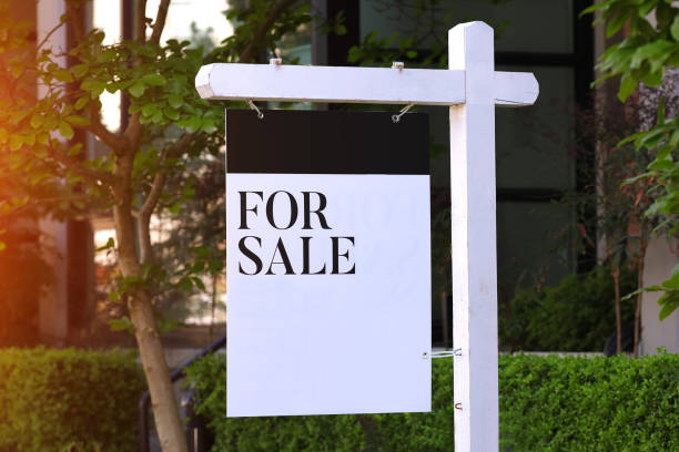 istock Real estate development for sale sign listing white black website 1332238535