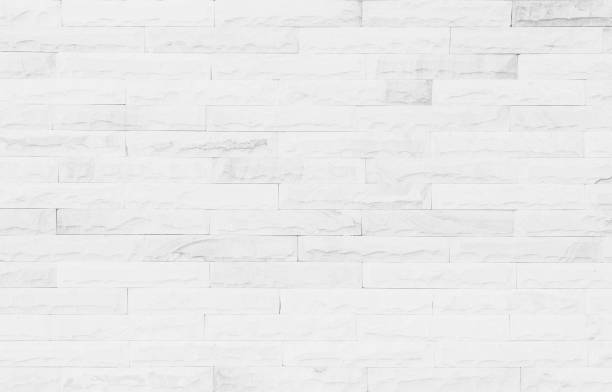 istock White grunge brick wall texture background for stone tile block painted in grey light color wallpaper modern interior and exterior and room backdrop design 1332240353