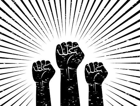 Three clenched fists raised up. Banner in the grunge style. The concept of protest, freedom, revolution, struggle for human rights, unification and brotherhood. Isolated. Vector illustration