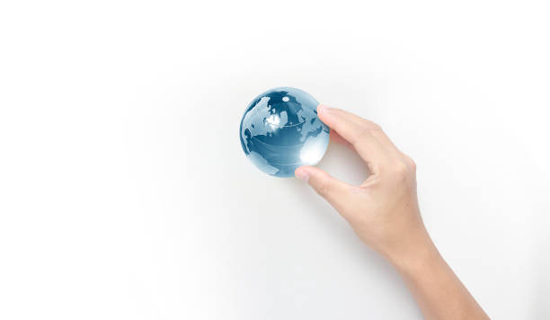 istock Globe in hand,Energy saving concept, image furnished by NASA 1332251100