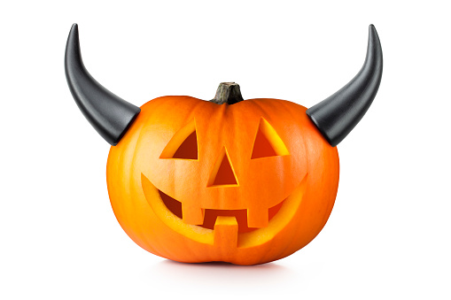 Halloween. Jack O'Lantern with horns isolated on a white background.