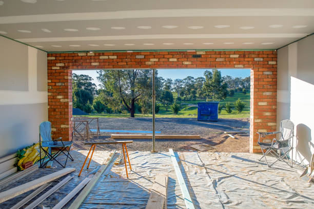 Residential house being built Residential home interior with insulation and plasterboard garage remodel stock pictures, royalty-free photos & images