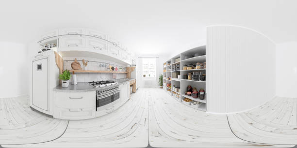 Modern kitchen countertop featuring electric toaster oven, wooden cutting board, glass jars with grains and pasta, ceramic bowls, mugs, utensils, open shelving, framed wall art