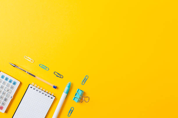 Back to schoo banner. Blue office supplies on yellow background. Flat lay. Copy space. Education and bussines concept Back to schoo banner. Blue office supplies on yellow background. Flat lay. Copy space. Education and bussines concept. back to schoo stock pictures, royalty-free photos & images