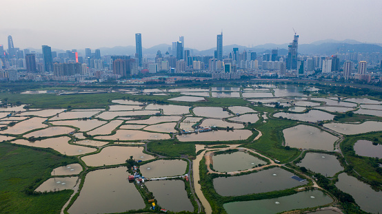 Aerial view of Ma Tso Lung  in Hong Kong,Far away is Shenzhen China area.