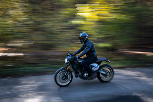 motorcycle rider in woods